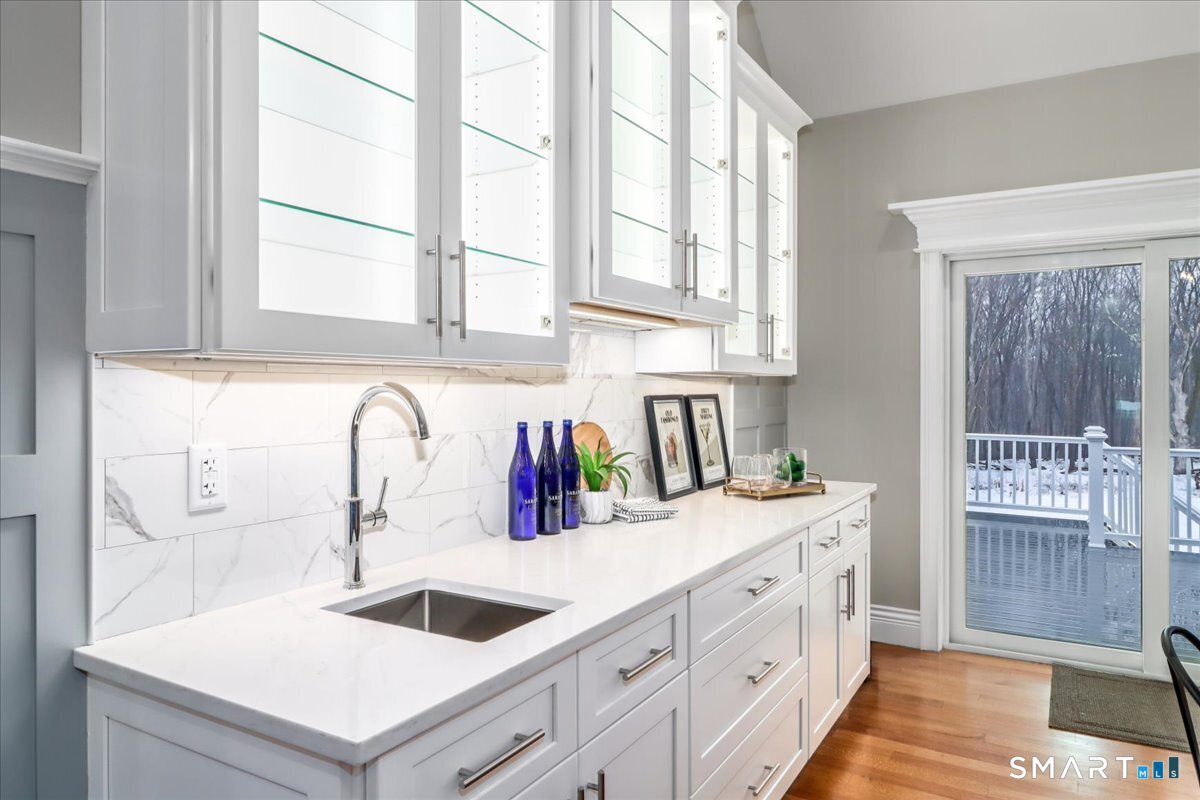 109 Codfish Hill Road Bethel, CT 06801 - Photo 10 of 43 a kitchen with granite countertop a sink and a window