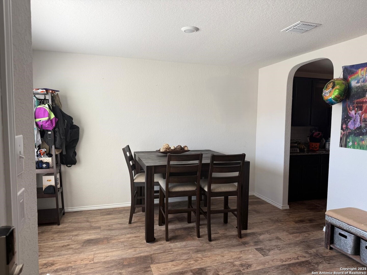 6411 Kendall Cove Converse, TX 78109 - Photo 7 of 9 a view of a dining room with furniture and wooden floor