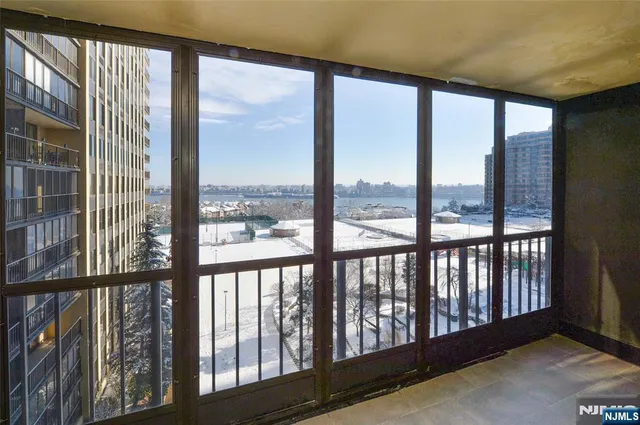 a view of a large window with an outdoor space