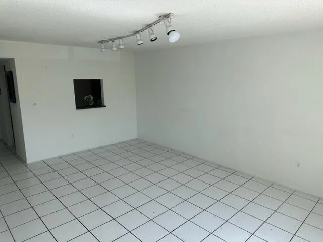 a view of a livingroom and entryway