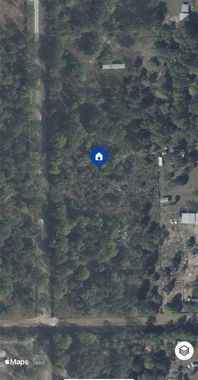 755 South Willow Street Clewiston, FL 33440 - Photo 2 of 3 a lamp that is in the middle of a field