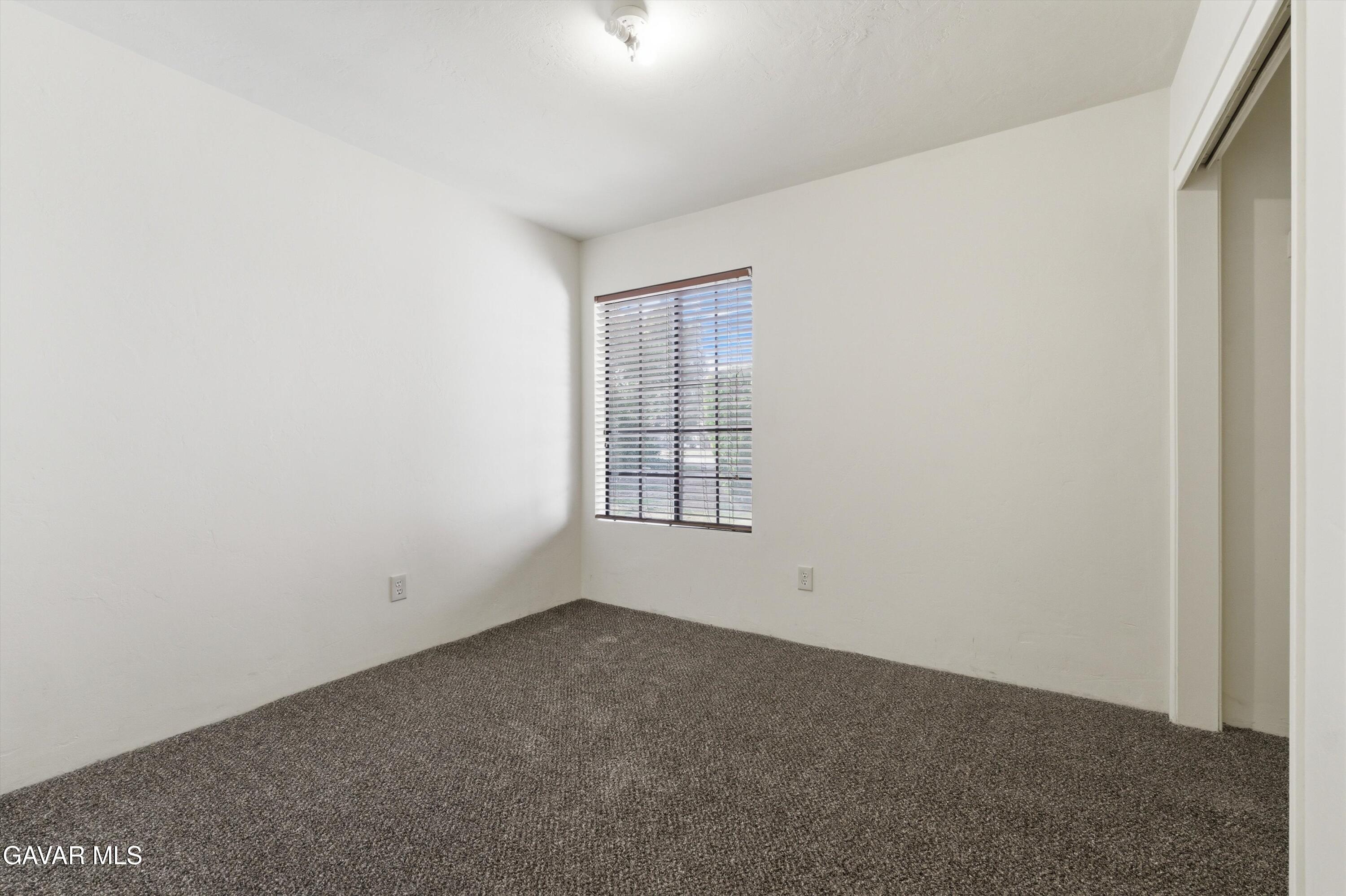 21410 Mission Street Tehachapi, CA 93561 - Photo 11 of 19 an empty room with a window