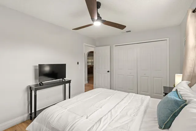 a white bath tub sitting in a bathroom