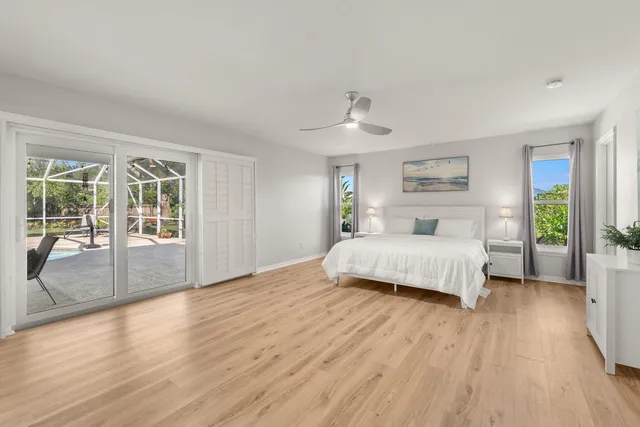 a bedroom with a bed and a table