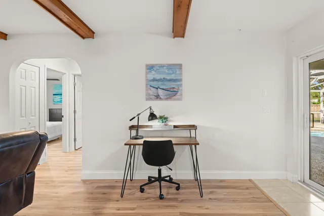 a wooden floor with a fireplace