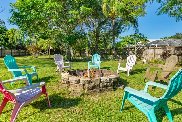 a view of a park with large trees