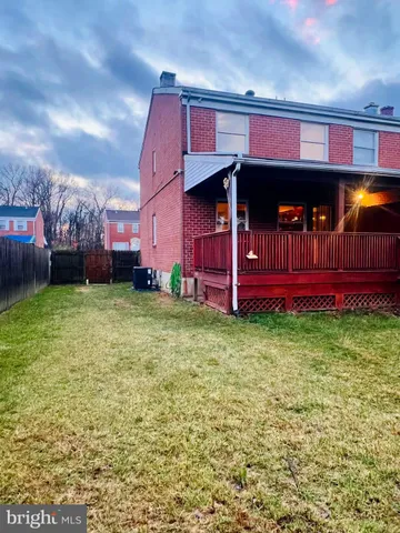 a front view of a building with garden