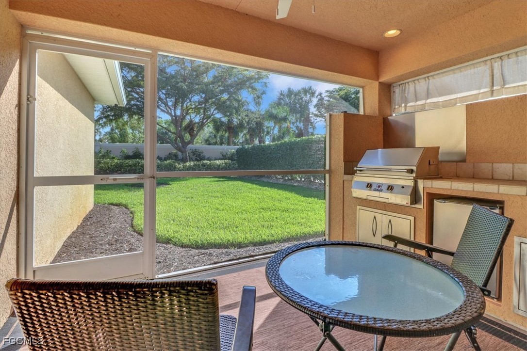 19674 Villa Rosa Loop Estero, FL 33967 - Photo 14 of 33 a view of a dining room with furniture window and outside view