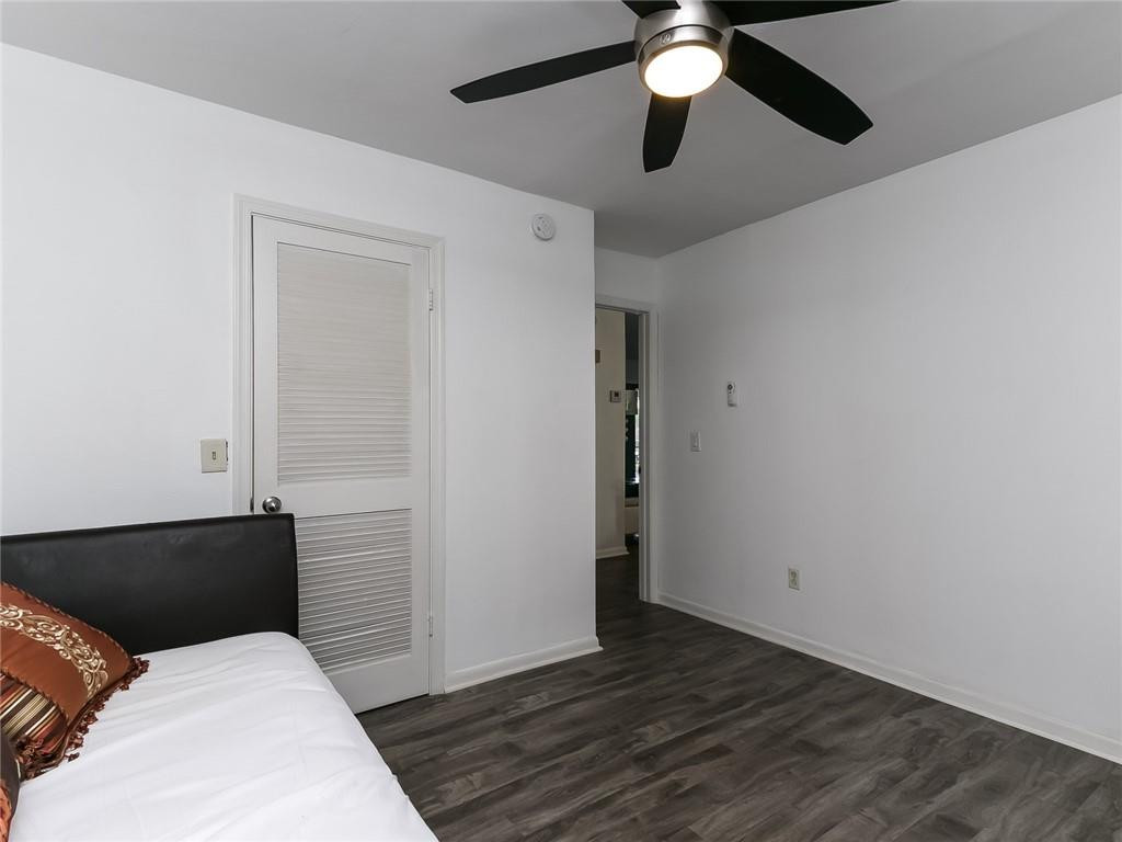22735 Southwest 66th Avenue, Unit 202 Boca Raton, FL 33428 - Photo 17 of 30 a view of empty room with wooden floor