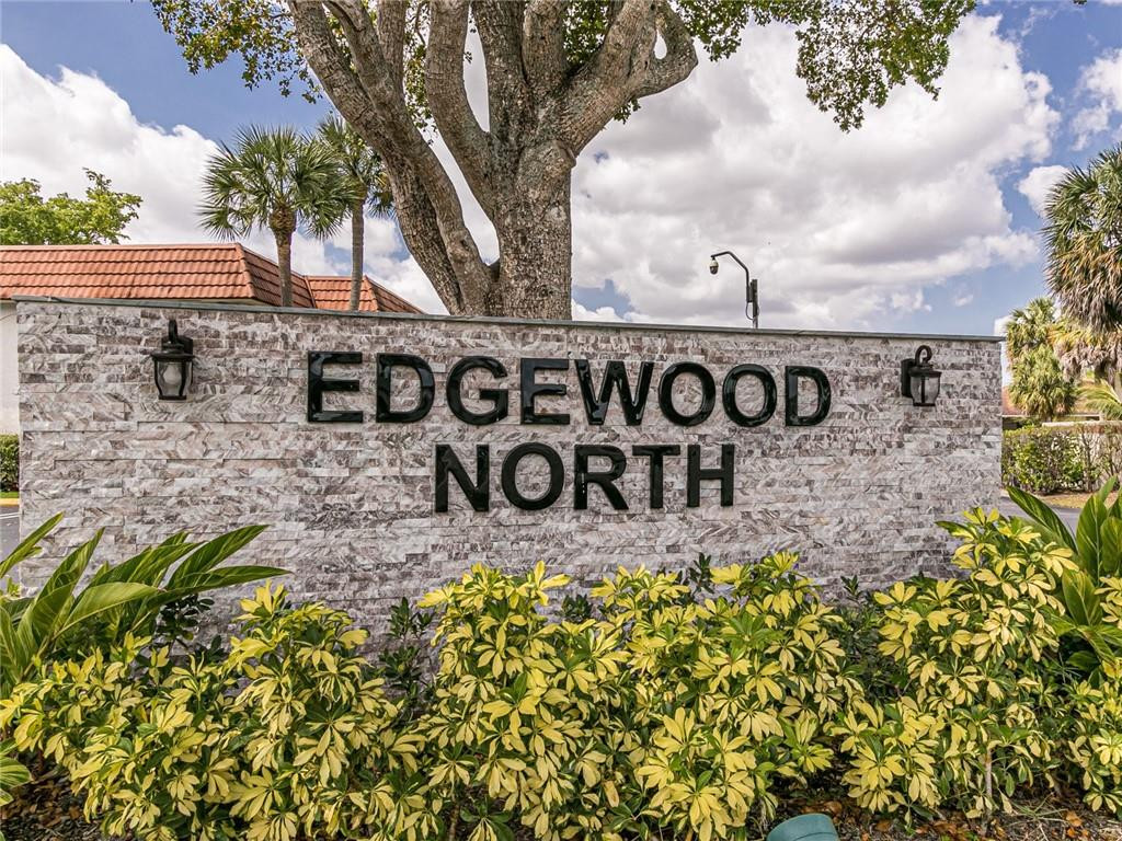 22735 Southwest 66th Avenue, Unit 202 Boca Raton, FL 33428 - Photo 30 of 30 a view of a sign board with wooden fence
