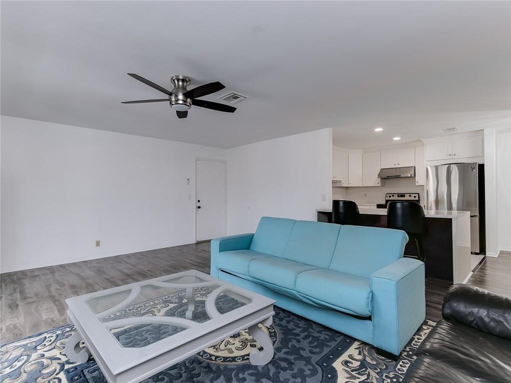 22735 Southwest 66th Avenue, Unit 202 Boca Raton, FL 33428 - Photo 10 of 30 a living room with furniture