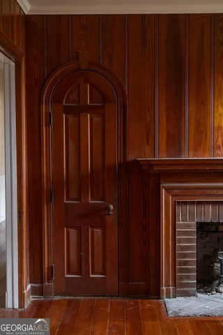 a view of entryway with wooden door