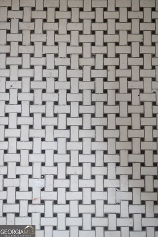 a brick wall with a mirror