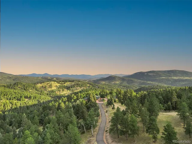 a view of a house with a street