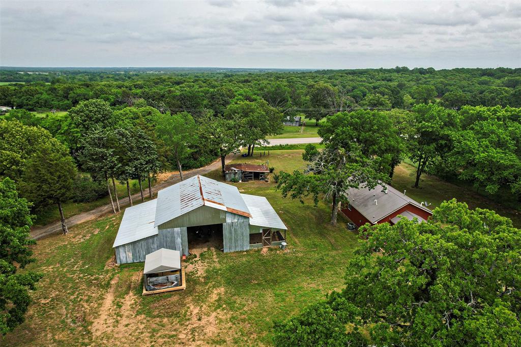 4850 Fm 1753 Denison, TX 75021 - Photo 13 of 23 an aerial view of a house with swimming pool and garden