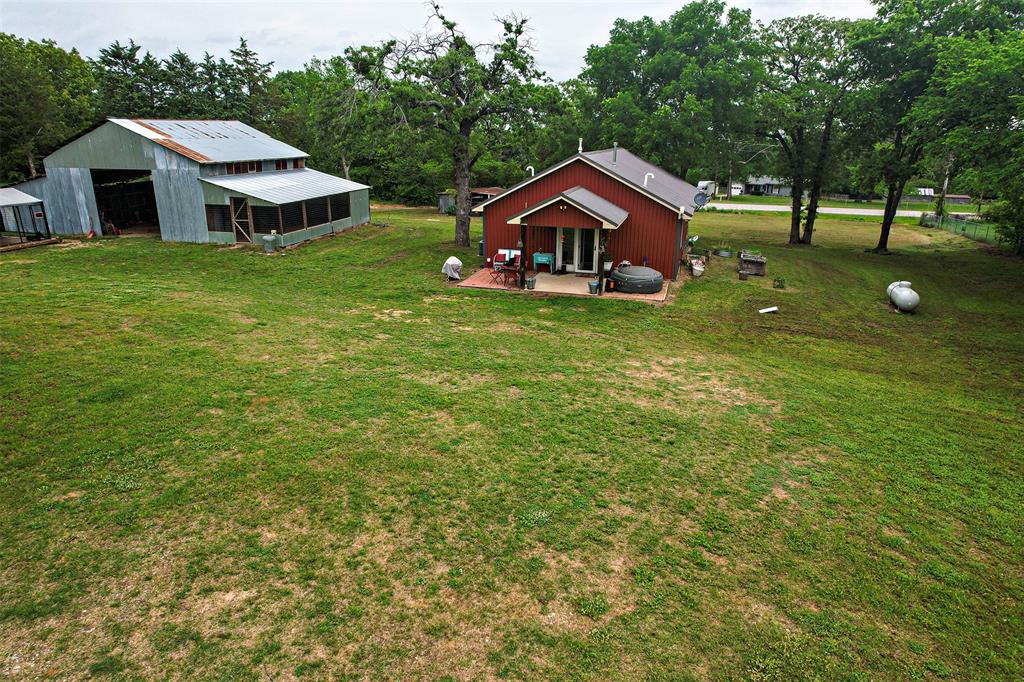 4850 Fm 1753 Denison, TX 75021 - Photo 15 of 23 a front view of house with yard and green space