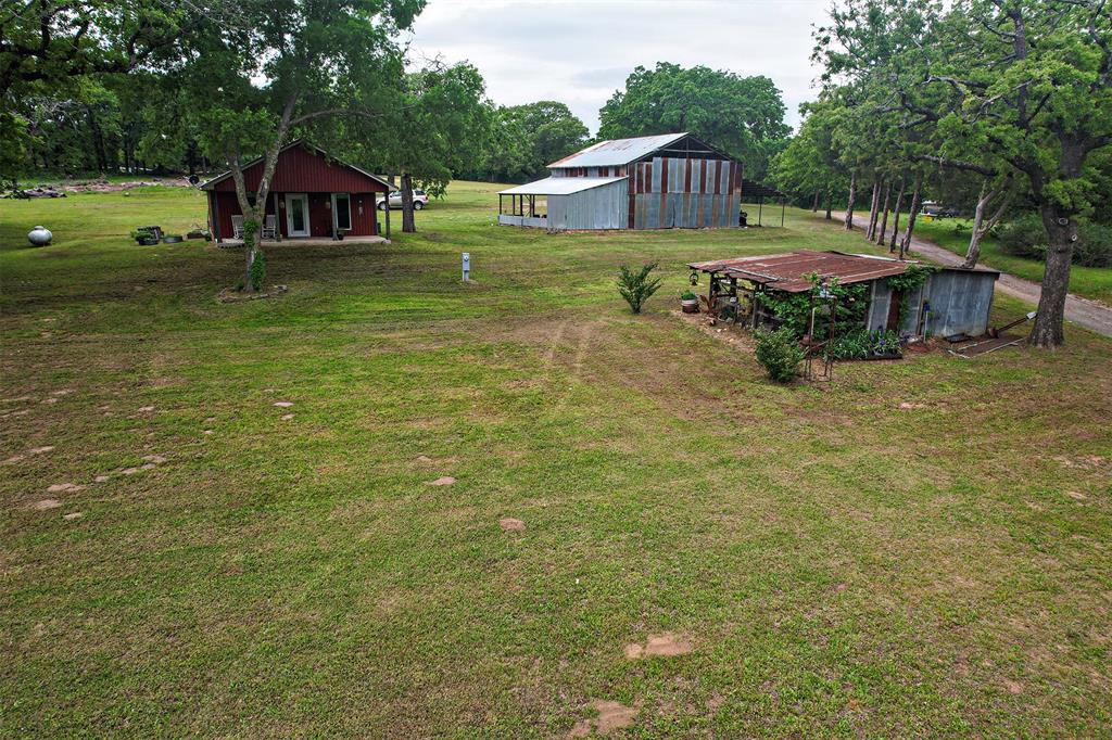 4850 Fm 1753 Denison, TX 75021 - Photo 19 of 23 a front view of a house with garden