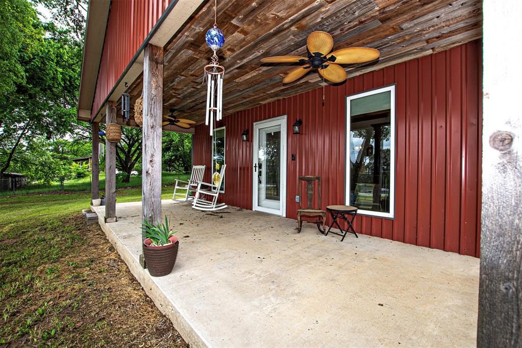 4850 Fm 1753 Denison, TX 75021 - Photo 2 of 23 a view of a house with backyard porch and sitting area