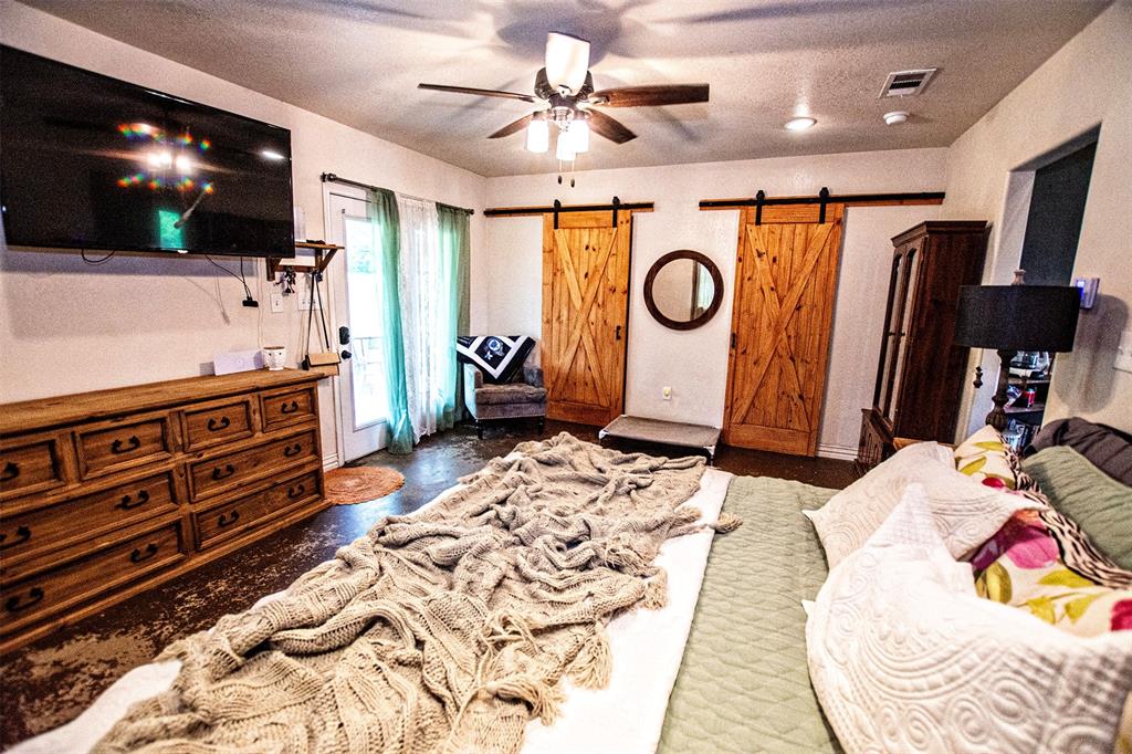 4850 Fm 1753 Denison, TX 75021 - Photo 9 of 23 a living room with furniture and a flat screen tv