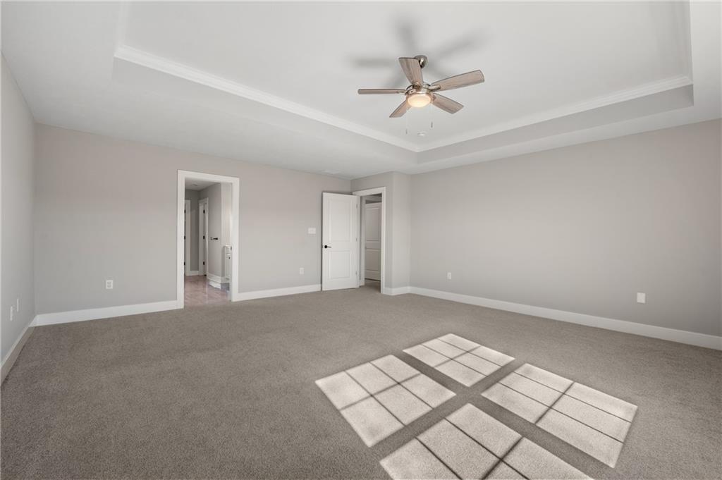 136 Pearce Road Mars, PA 16046 - Photo 16 of 44 a view of an empty room and a chandelier fan