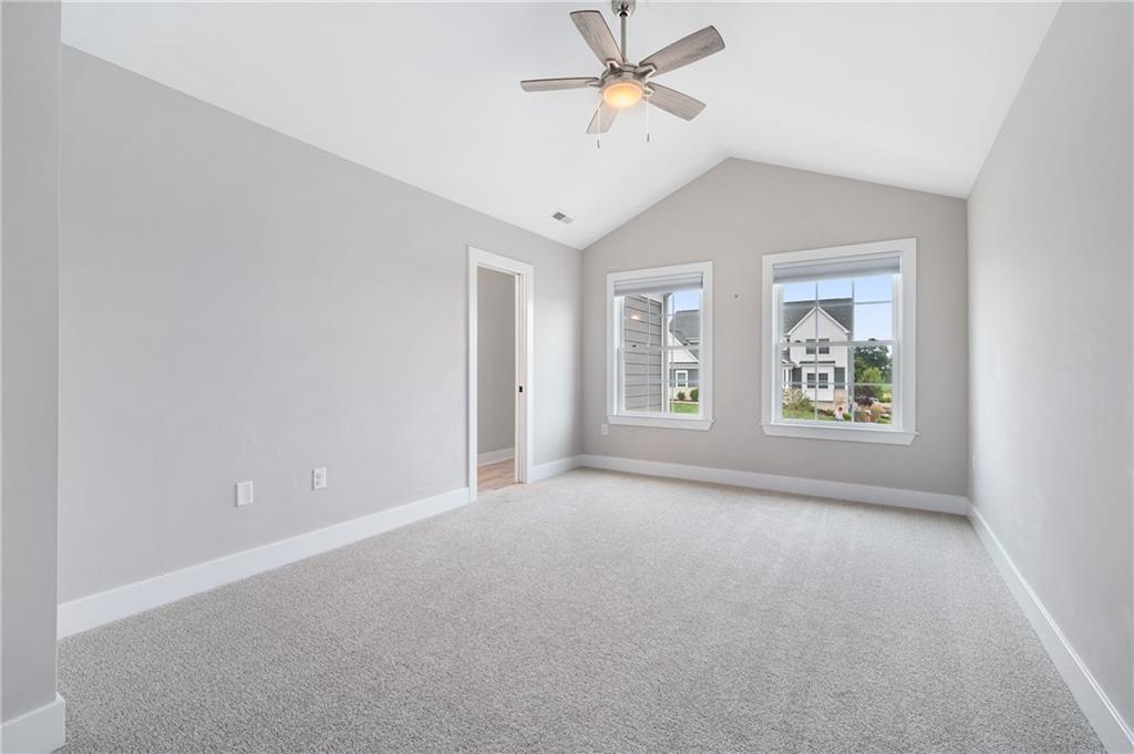 136 Pearce Road Mars, PA 16046 - Photo 20 of 44 an empty room with windows and fan