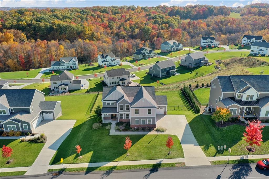 136 Pearce Road Mars, PA 16046 - Photo 40 of 44 an aerial view of a house with a garden and houses