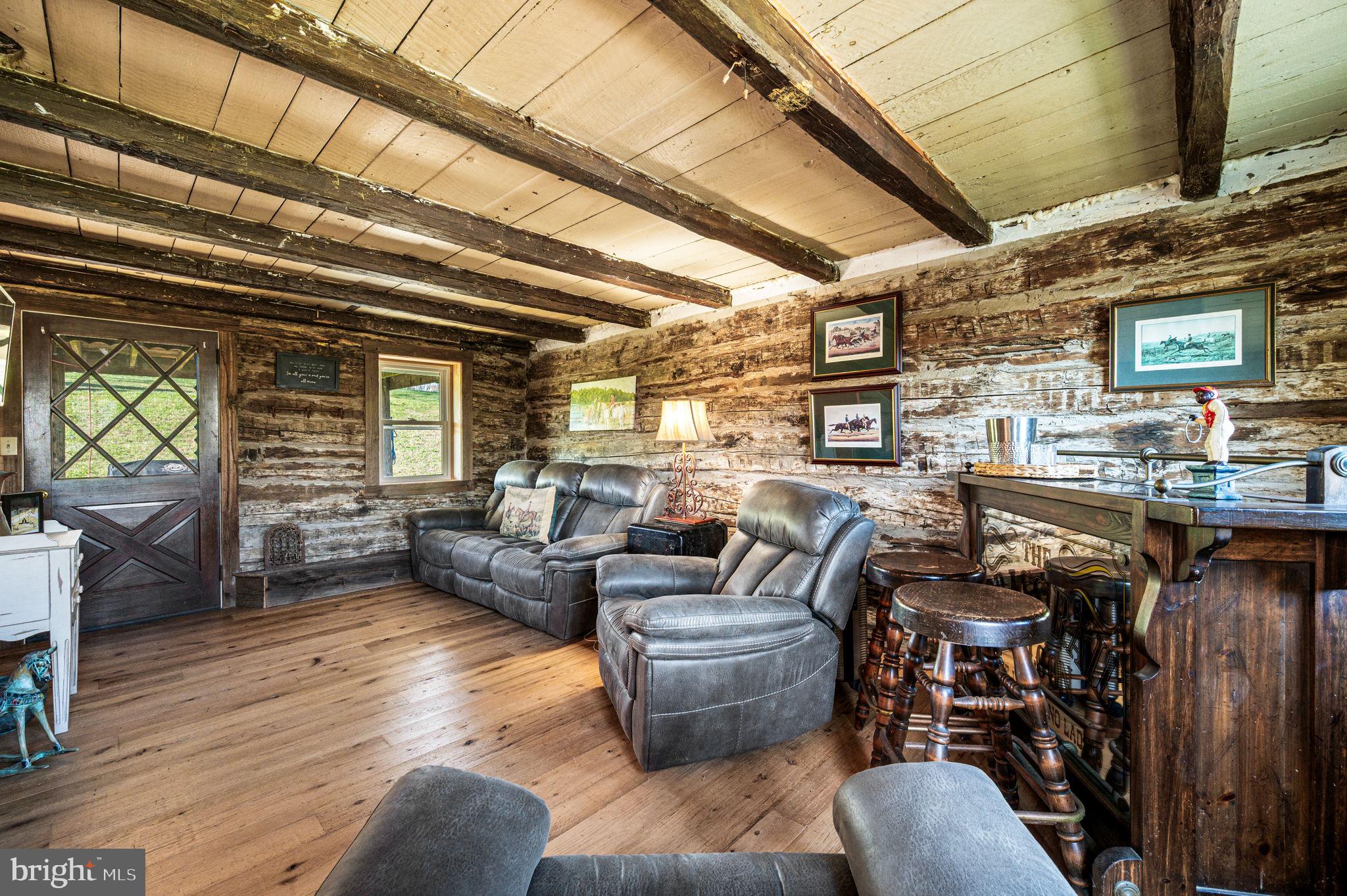 1725 Goosetown Road Coatesville, PA 19320 - Photo 3 of 34 a living room with furniture and a fireplace