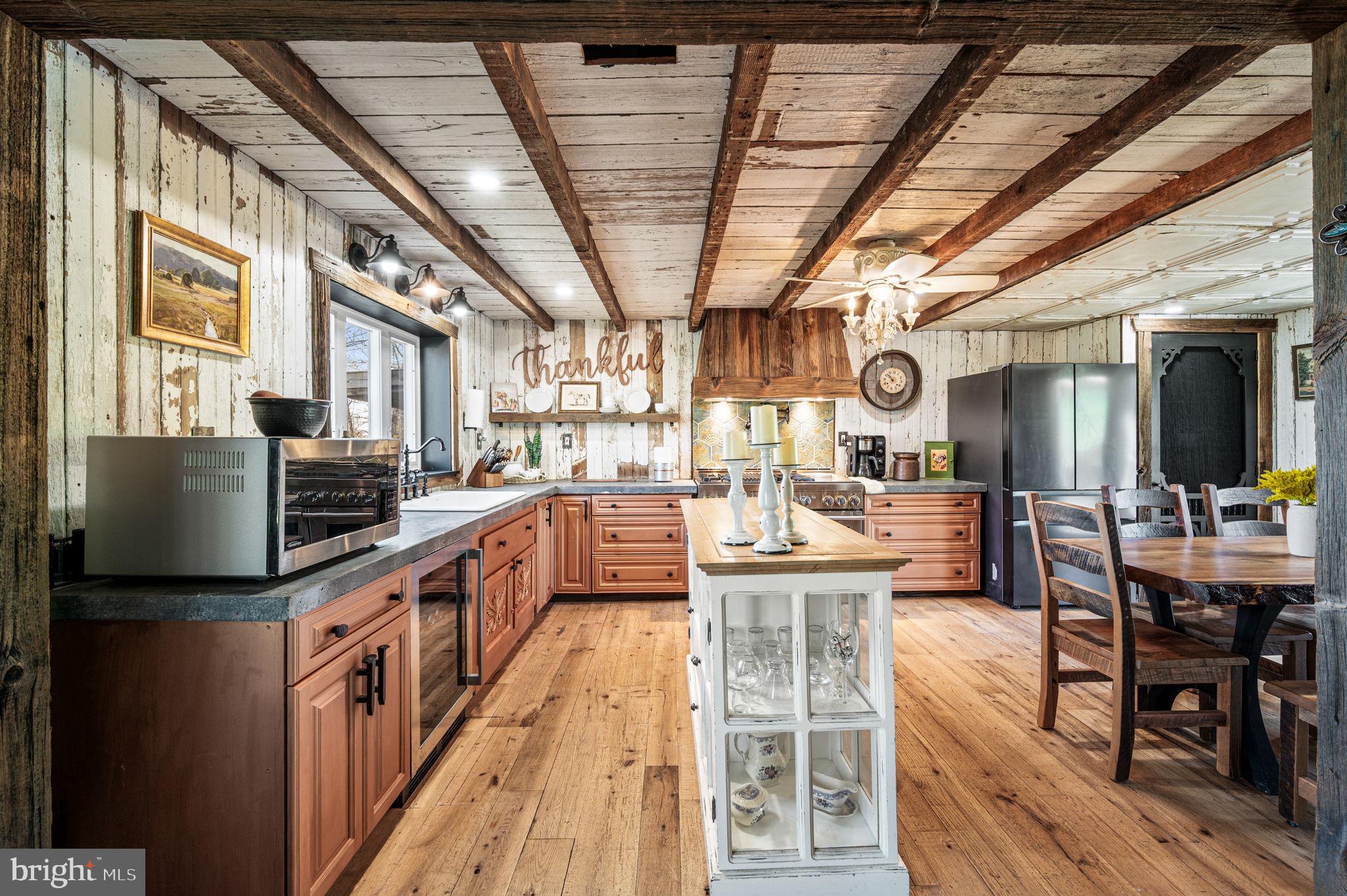 1725 Goosetown Road Coatesville, PA 19320 - Photo 5 of 34 a kitchen with stainless steel appliances granite countertop a stove and cabinets