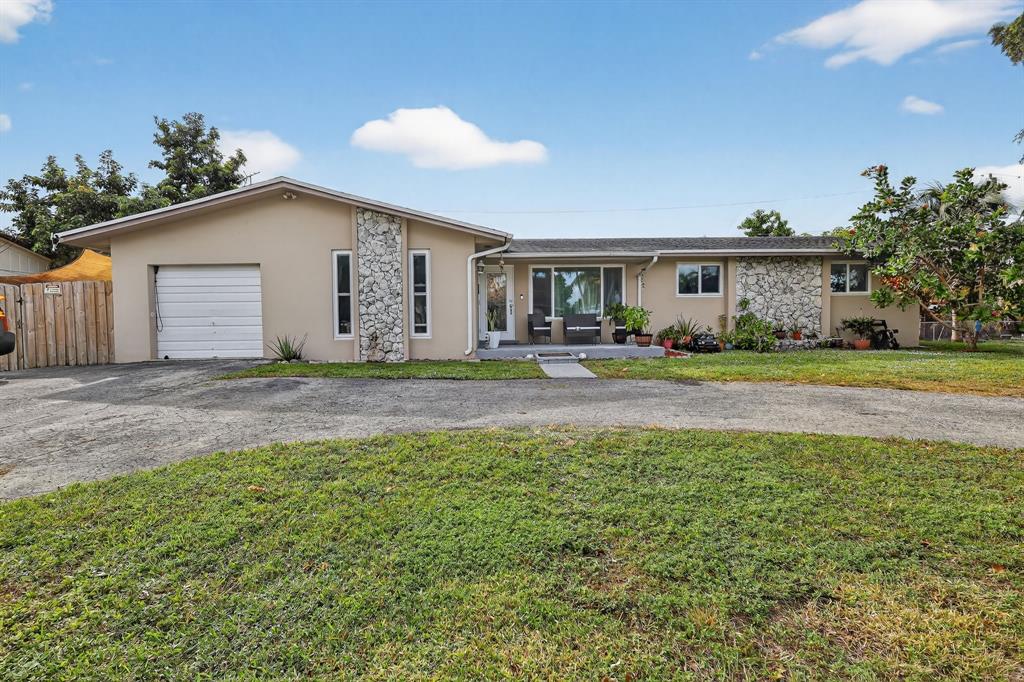 a house view with a garden space