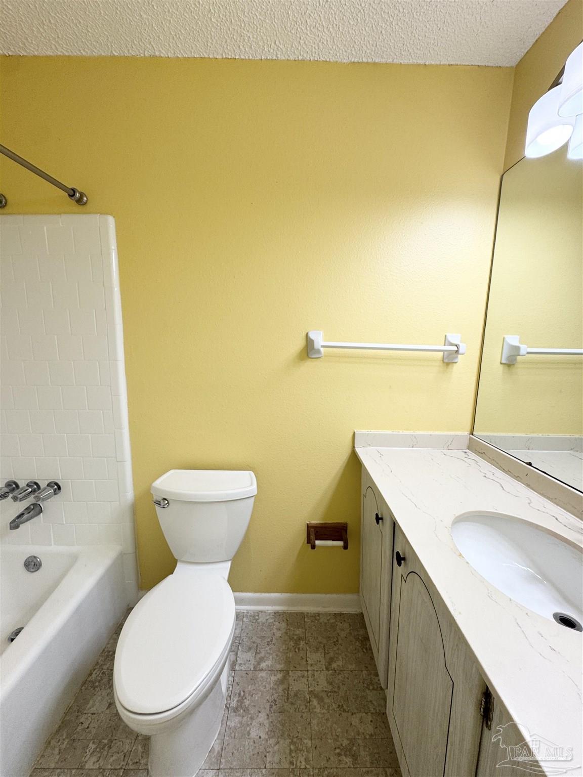 6320 Denver Avenue Pensacola, FL 32526 - Photo 19 of 28 a bathroom with a sink and a toilet