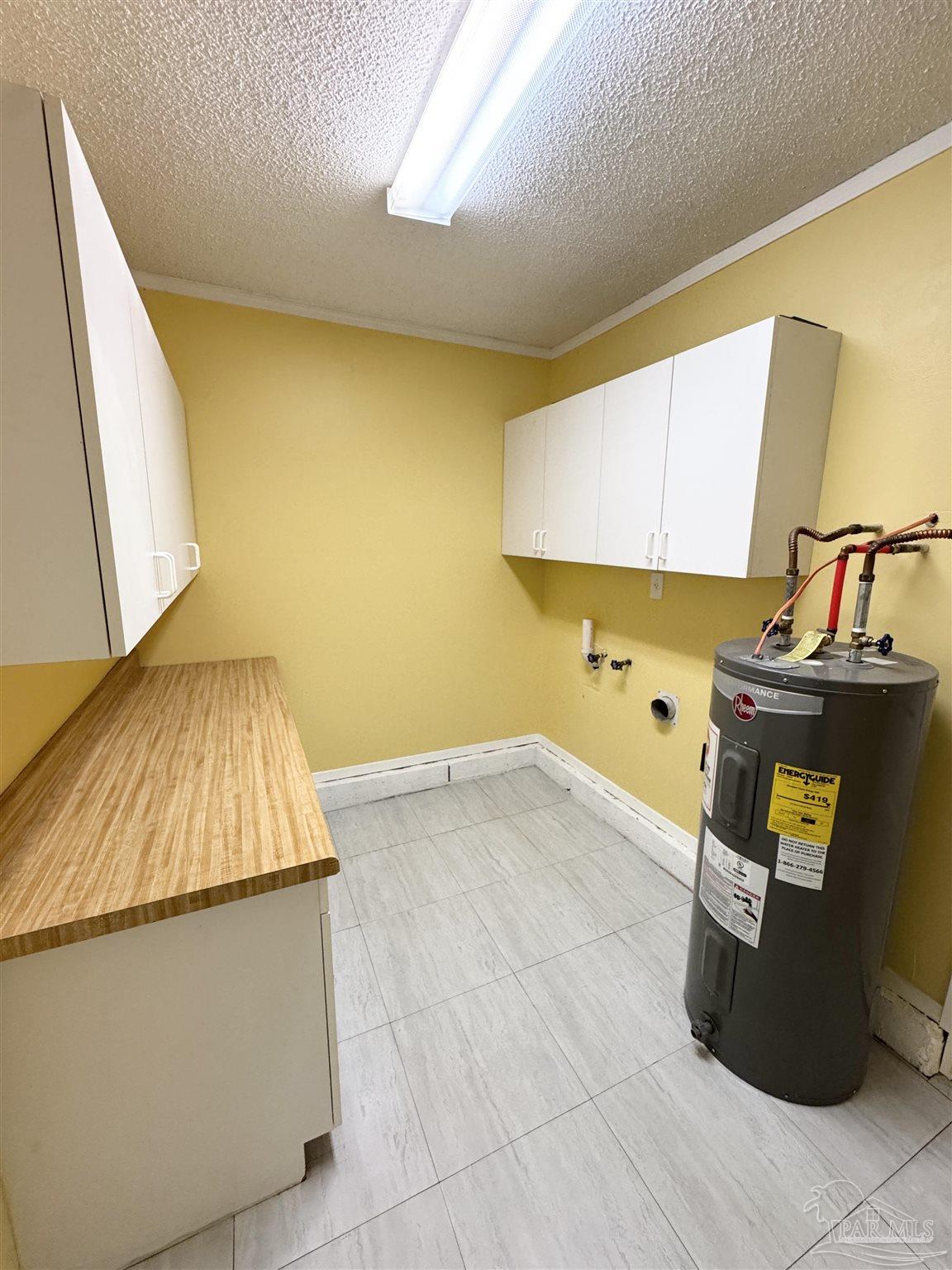 6320 Denver Avenue Pensacola, FL 32526 - Photo 9 of 28 a bed room with a bed and teddy bear