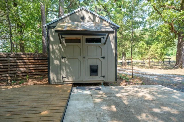 a view of a house with a small yard