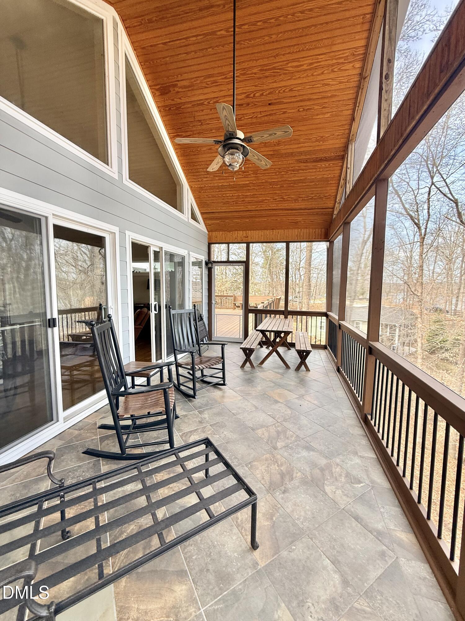 250 Bunny Rabbit Road Leasburg, NC 27291 - Photo 12 of 66 a view of a patio with table and chairs