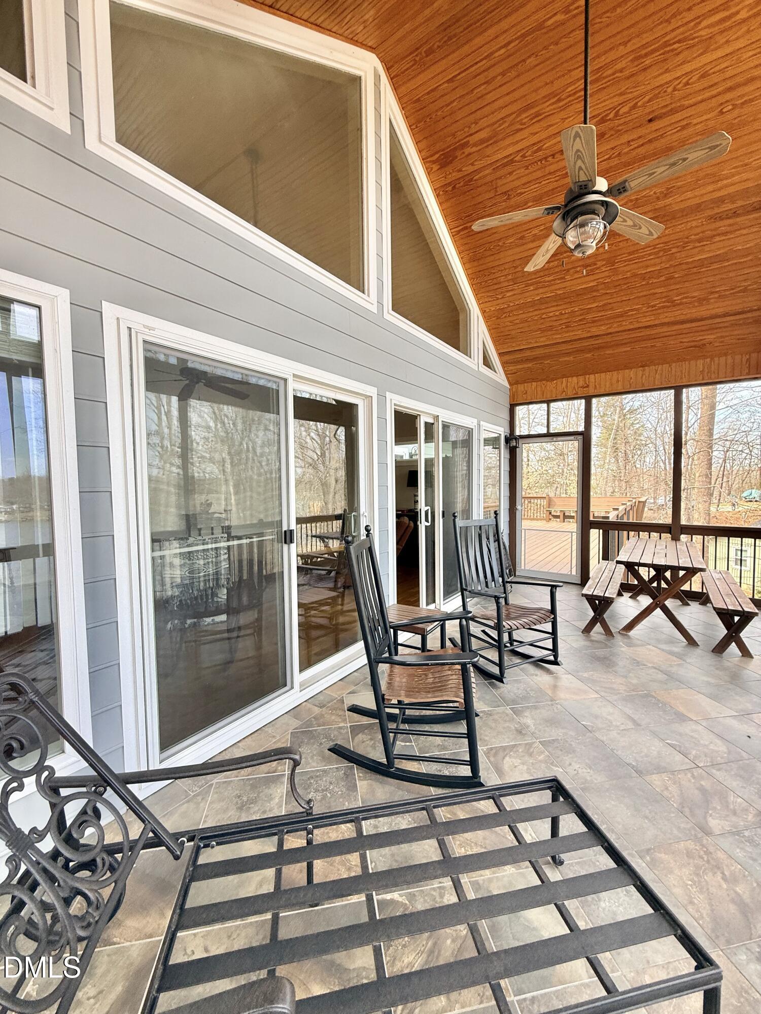 250 Bunny Rabbit Road Leasburg, NC 27291 - Photo 13 of 66 a view of a lobby with chair and glass door