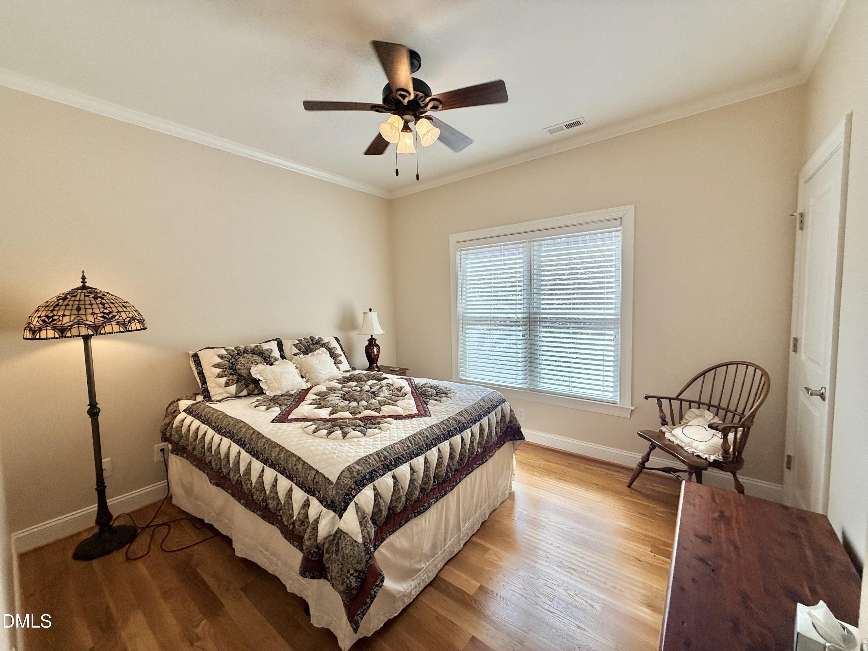 250 Bunny Rabbit Road Leasburg, NC 27291 - Photo 28 of 66 a bedroom with bed and window