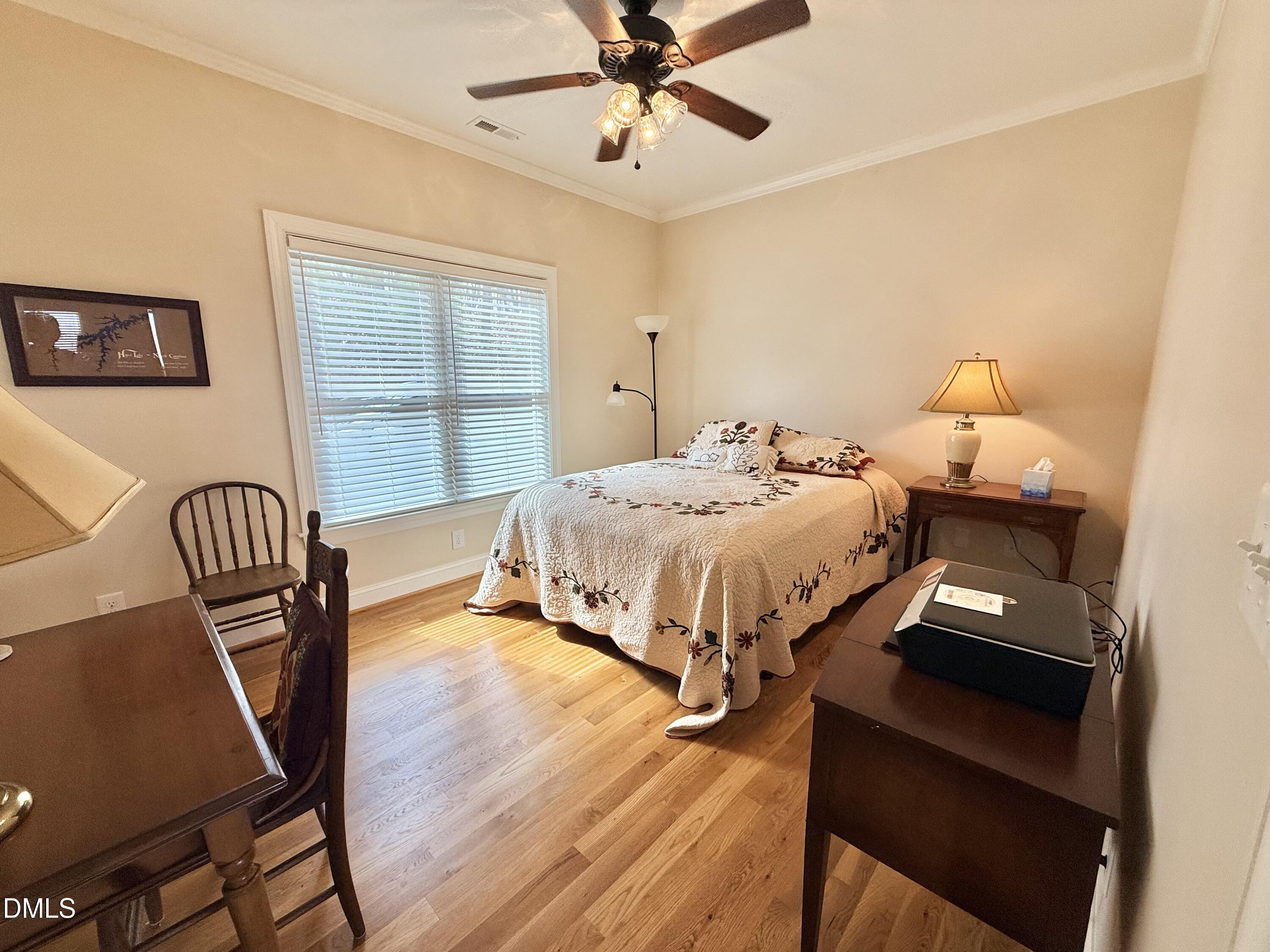 250 Bunny Rabbit Road Leasburg, NC 27291 - Photo 33 of 66 a bedroom with a bed and a desk