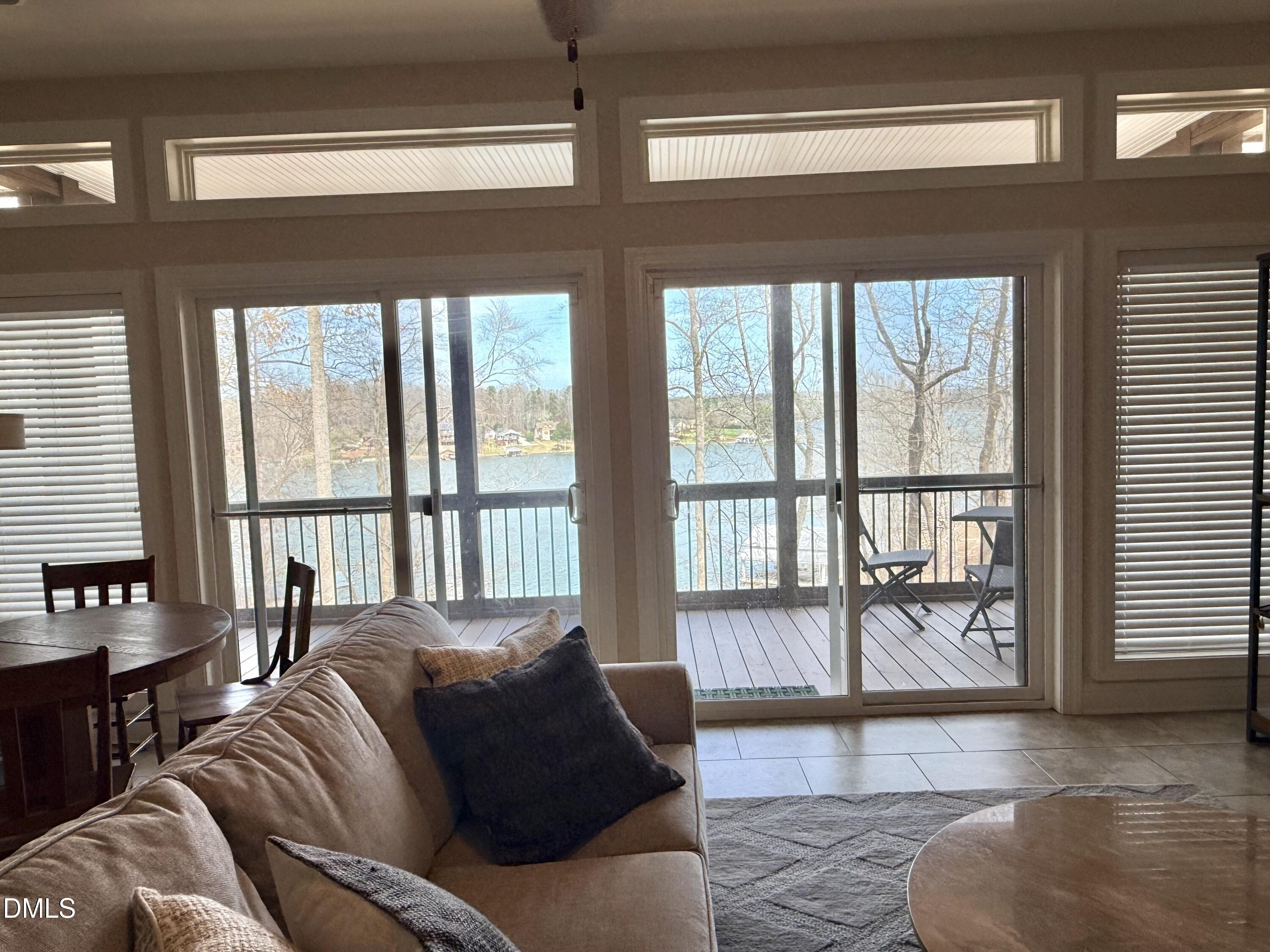 250 Bunny Rabbit Road Leasburg, NC 27291 - Photo 35 of 66 a living room with a large bed and a large window