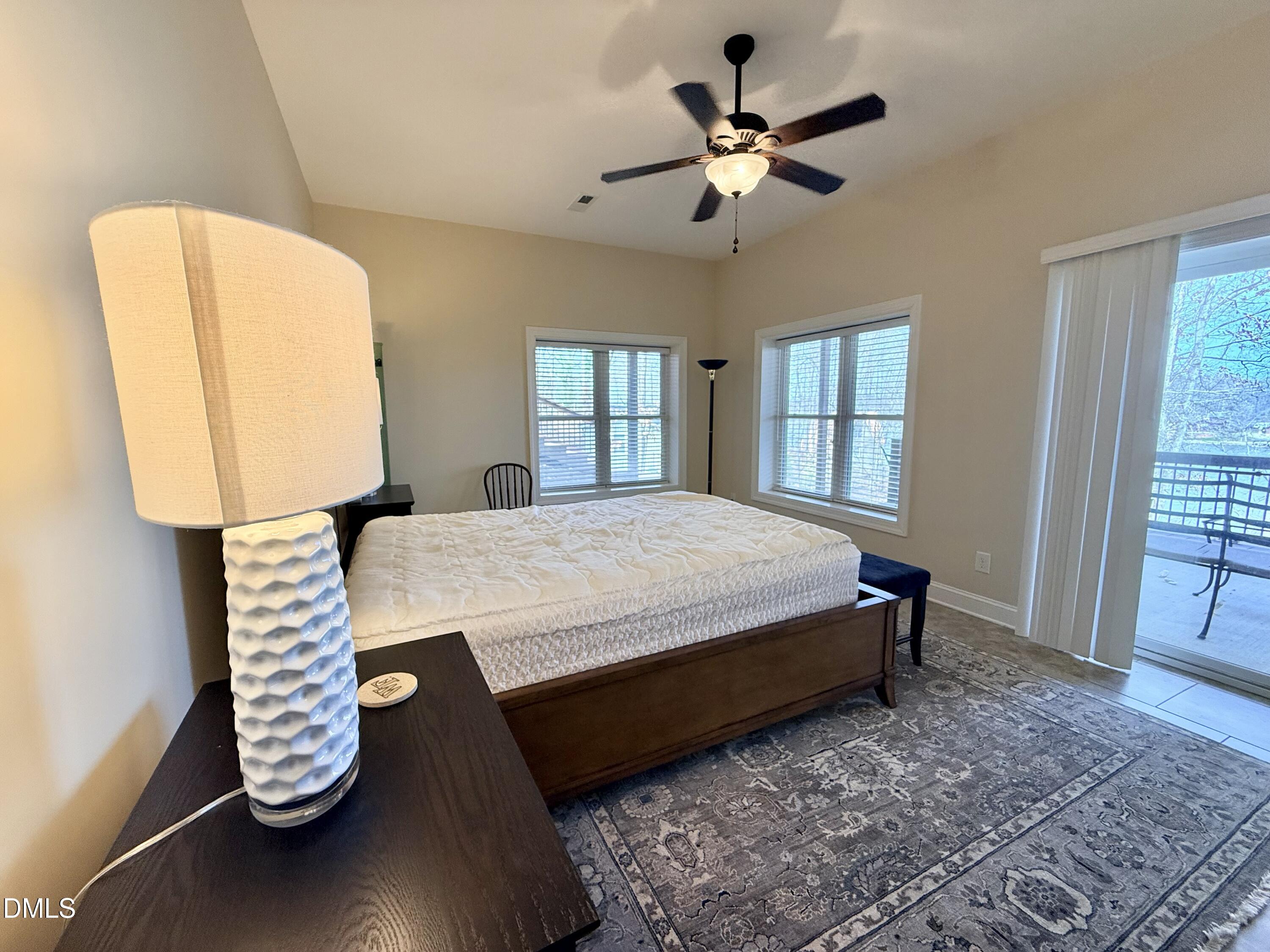 250 Bunny Rabbit Road Leasburg, NC 27291 - Photo 38 of 66 a bed sitting in a room next to a window