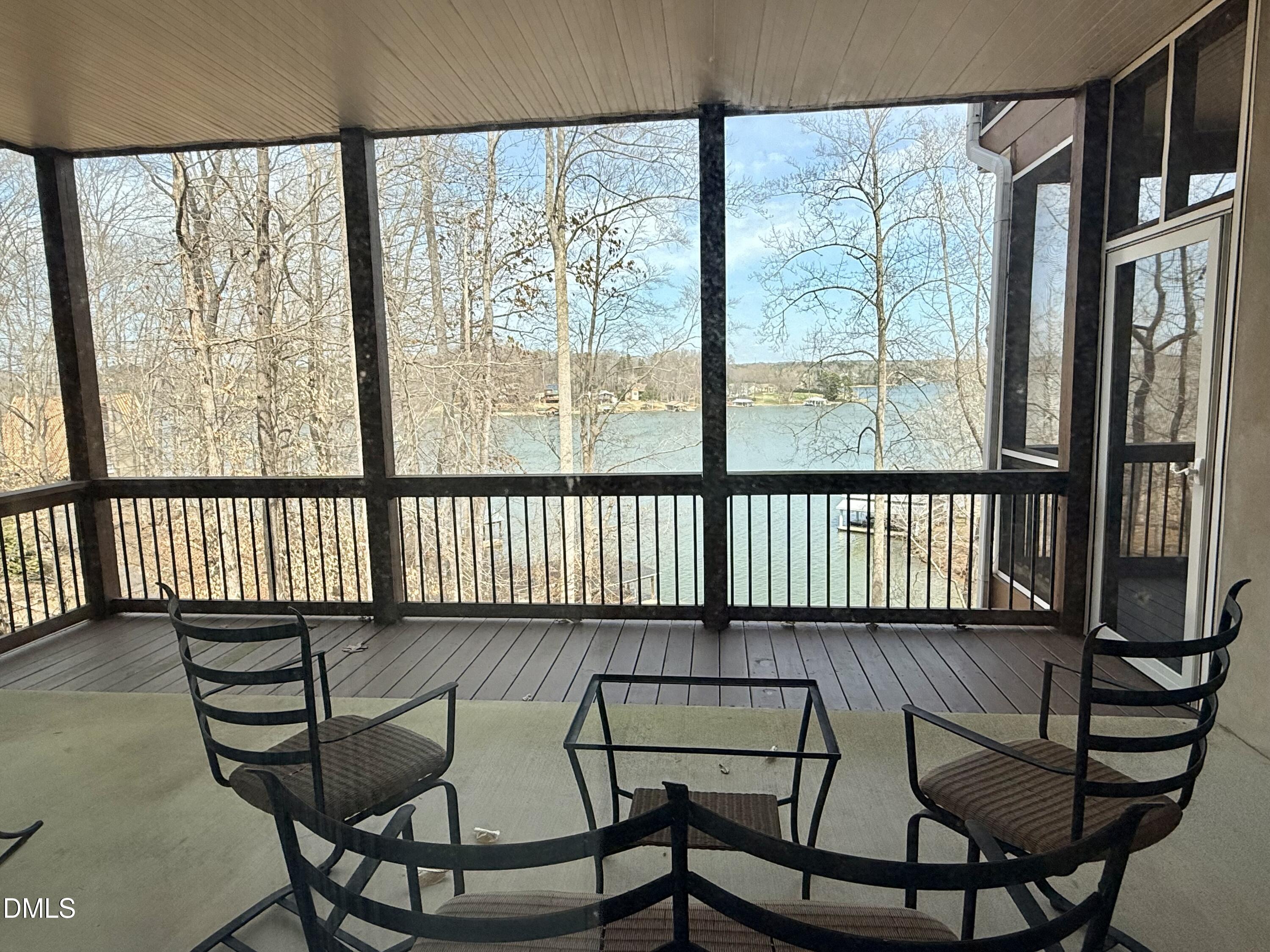 250 Bunny Rabbit Road Leasburg, NC 27291 - Photo 48 of 66 a view of a chairs and table in the balcony