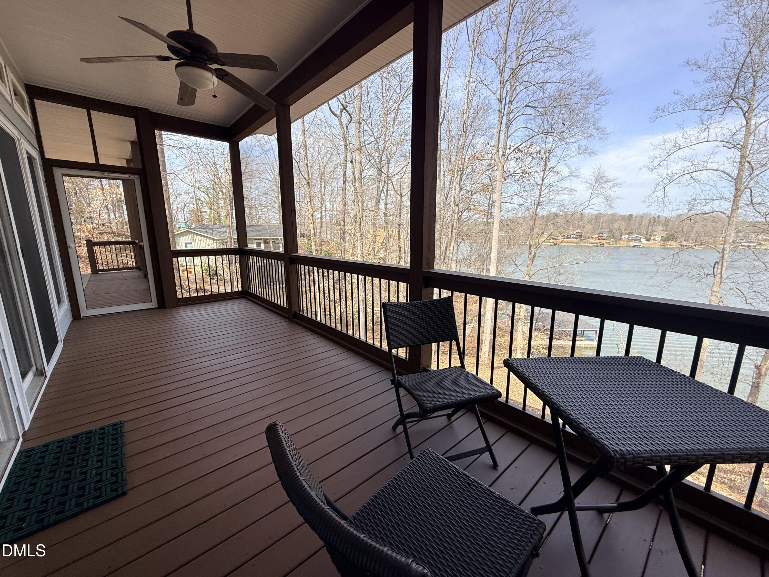 250 Bunny Rabbit Road Leasburg, NC 27291 - Photo 49 of 66 a view of a dining room with furniture window and wooden floor