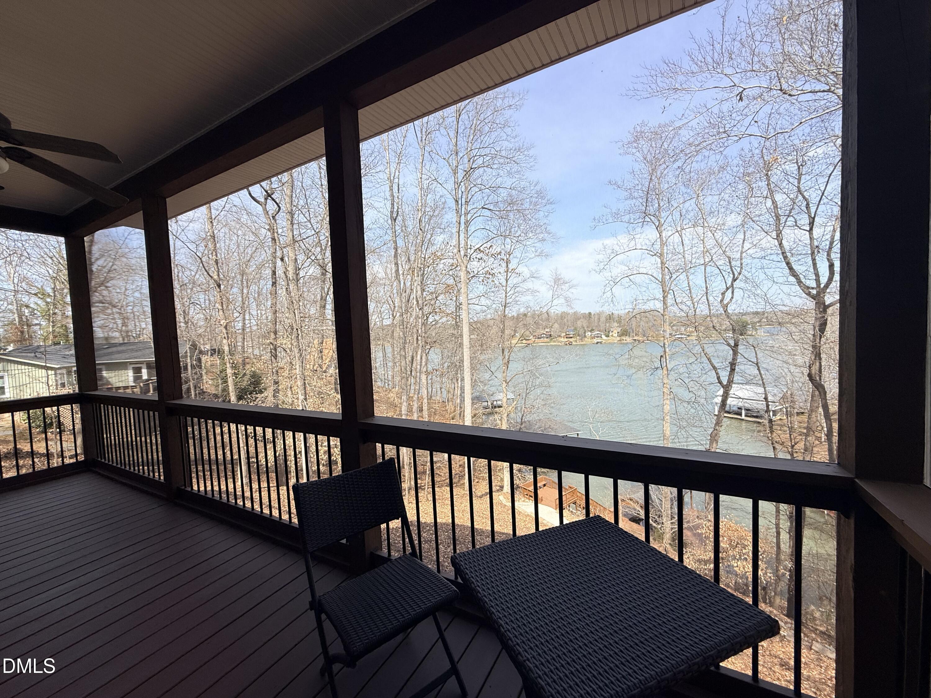 250 Bunny Rabbit Road Leasburg, NC 27291 - Photo 51 of 66 a view of a two chairs and table in the balcony