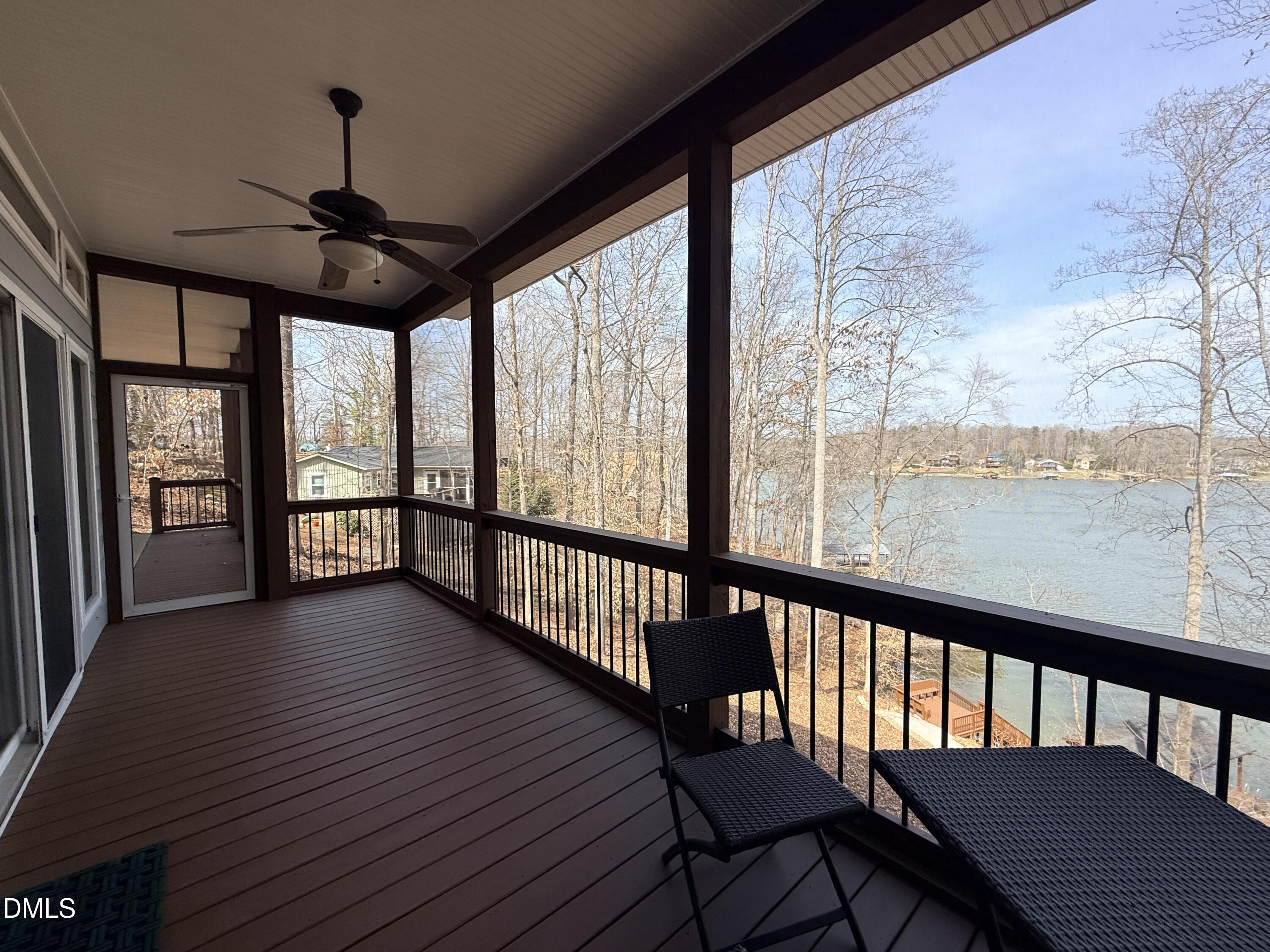 250 Bunny Rabbit Road Leasburg, NC 27291 - Photo 52 of 66 a view of a room with wooden floor windows and outdoor view