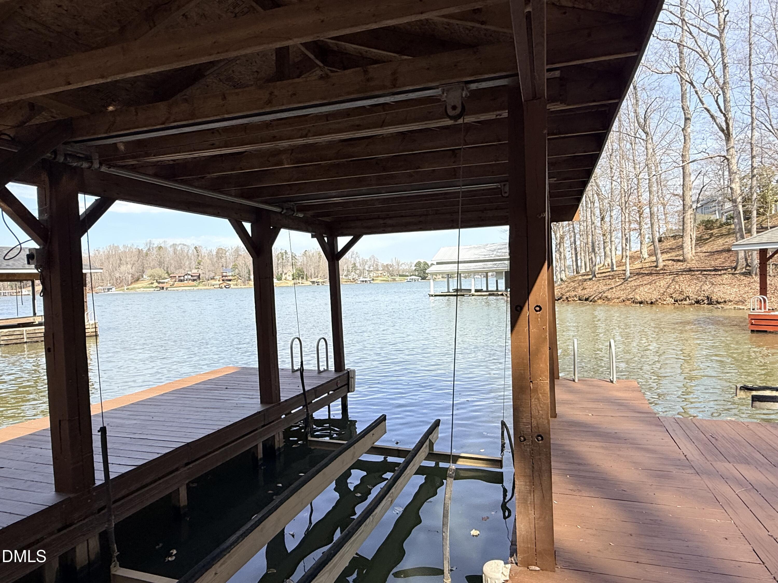 250 Bunny Rabbit Road Leasburg, NC 27291 - Photo 64 of 66 a view of a balcony with wooden floor