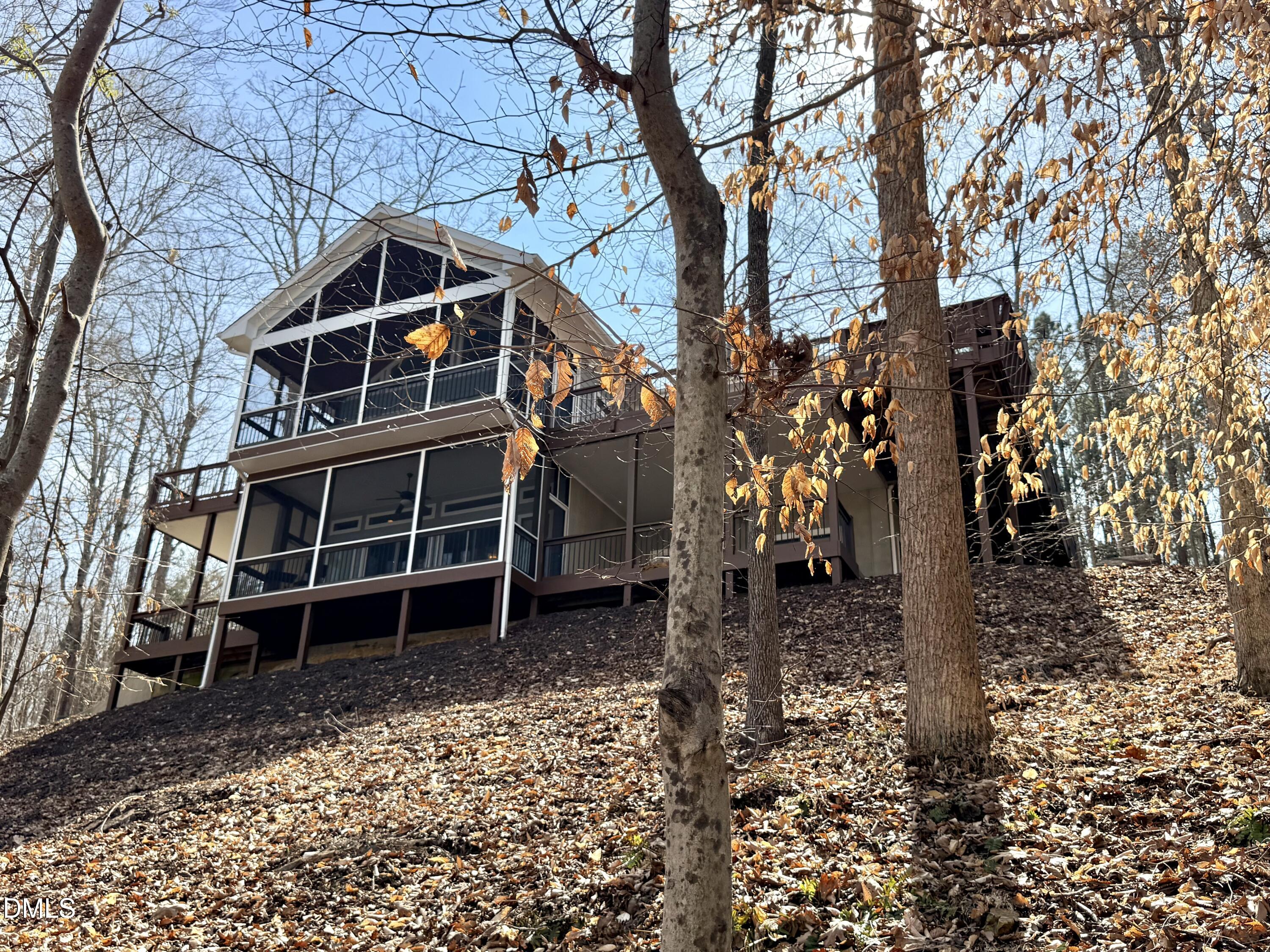 250 Bunny Rabbit Road Leasburg, NC 27291 - Photo 66 of 66 a front view of a house with a yard