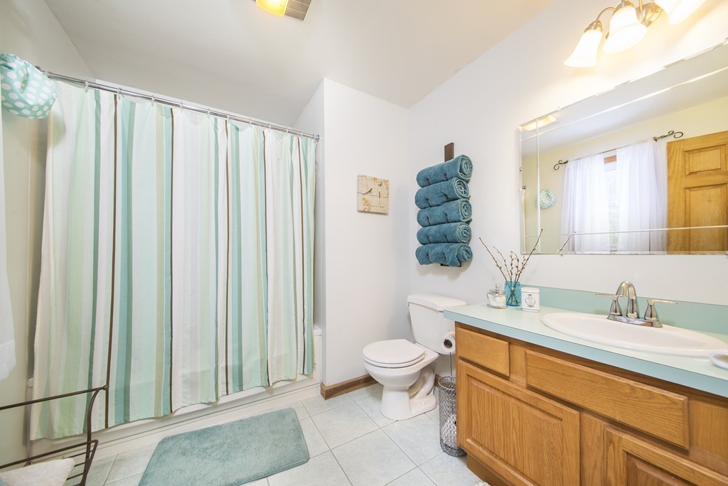 118 Wales Road Monson, MA 01057 - Photo 13 of 30 a bathroom with a granite countertop sink and a mirror