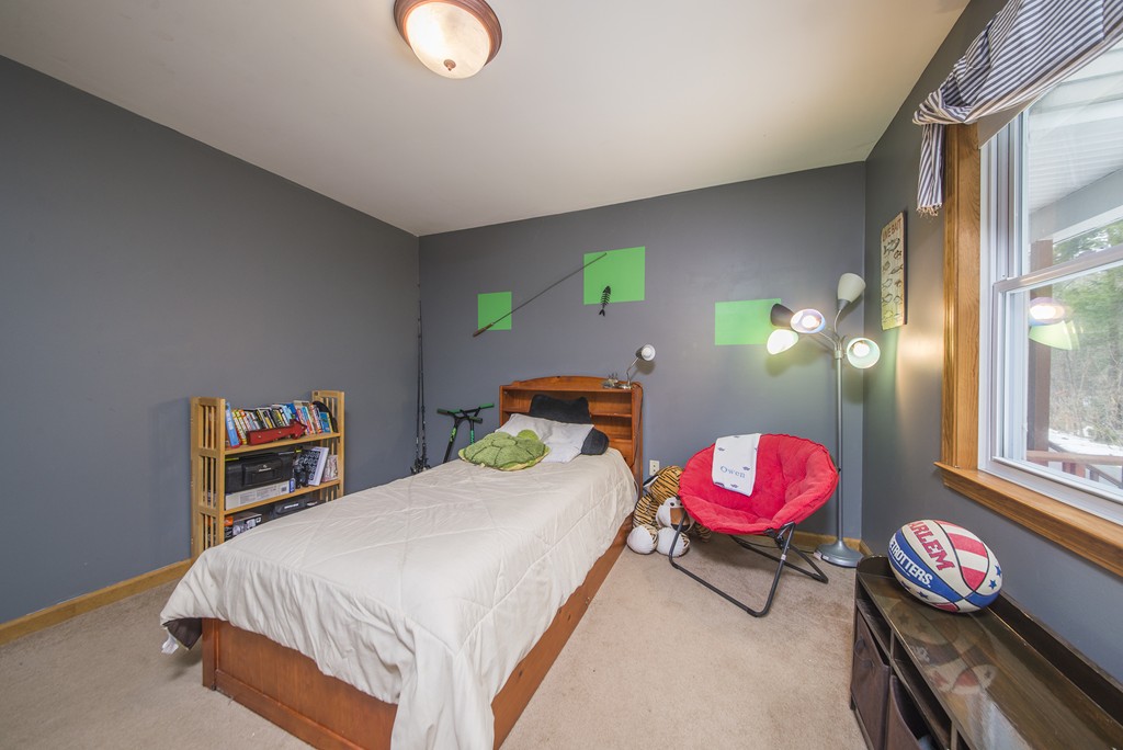 118 Wales Road Monson, MA 01057 - Photo 18 of 30 a bedroom with a bed next to a window and dresser