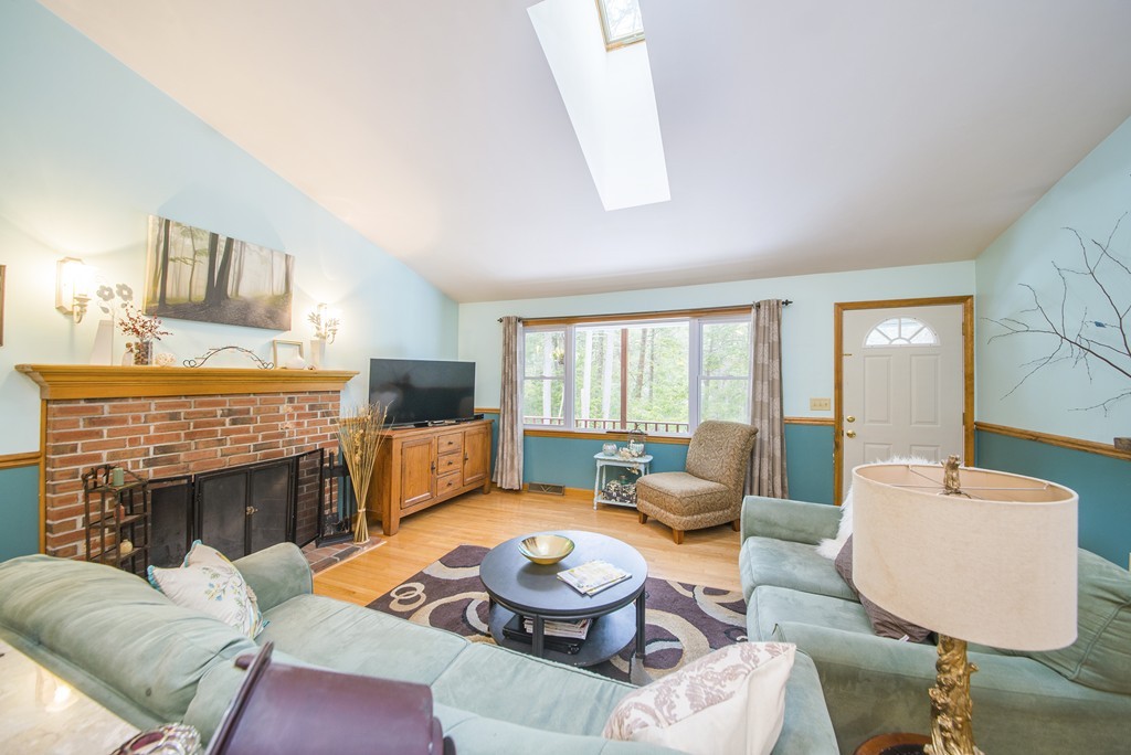 118 Wales Road Monson, MA 01057 - Photo 4 of 30 a living room with furniture fireplace and flat screen tv