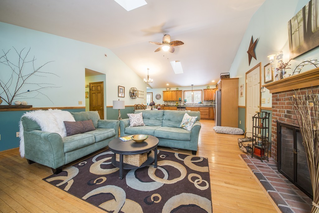 118 Wales Road Monson, MA 01057 - Photo 5 of 30 a living room with furniture and a fireplace