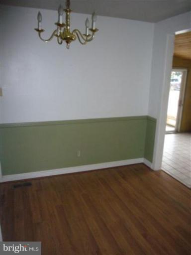 1519 Providence Road Towson, MD 21286 - Photo 3 of 9 a view of room with hardwood floor and window