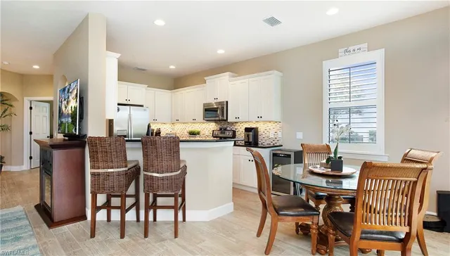 $449,900 | 12045 Covent Garden Court, Unit 2104, Naples, FL 34120